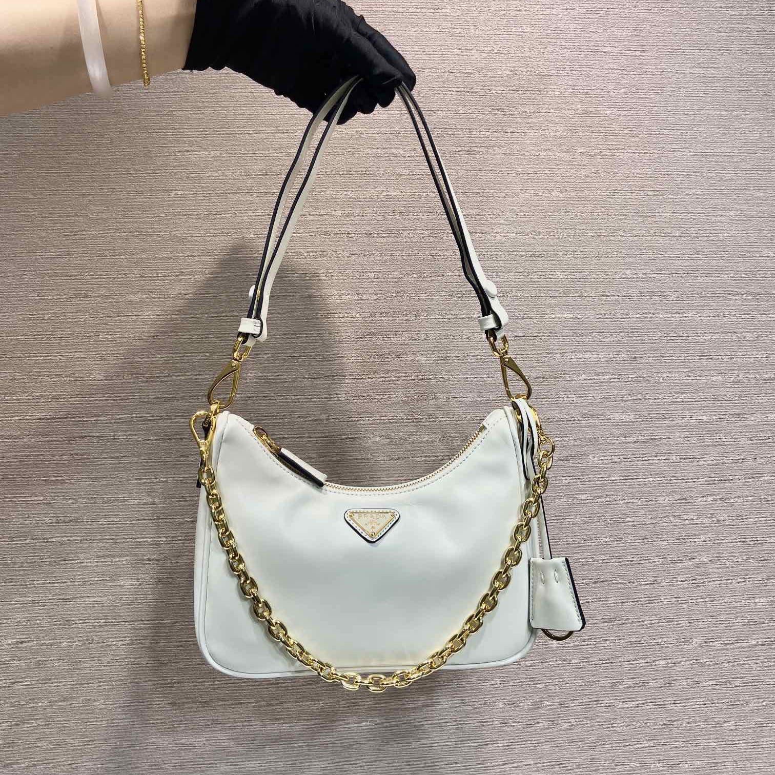 Pra*a top handle bags